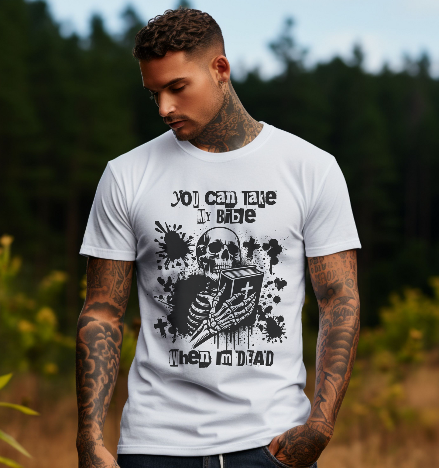 man wearing a funny christian shirt that says you can take my bible when im dead with an image of a skeleton holding a bible